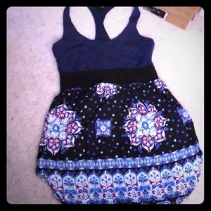 Long tunic tank with razor back